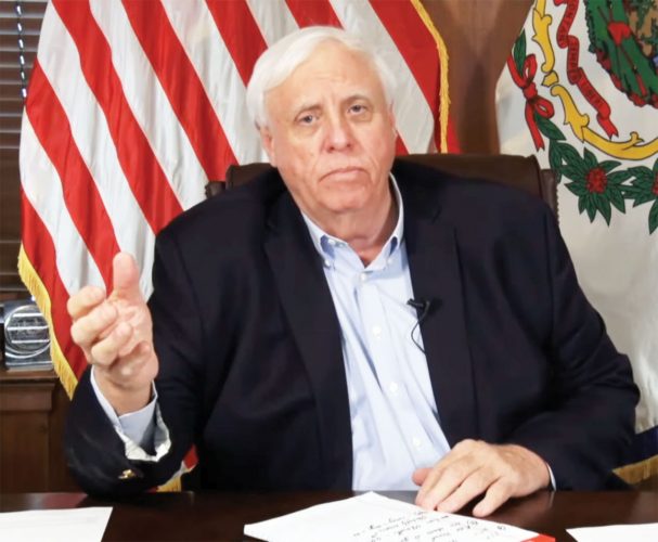 Justice: Wait and see on mask mandate bill